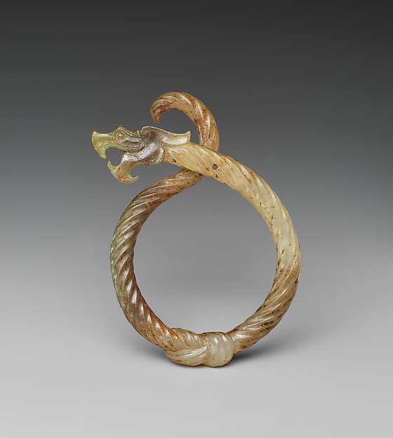 Knotted dragon ring