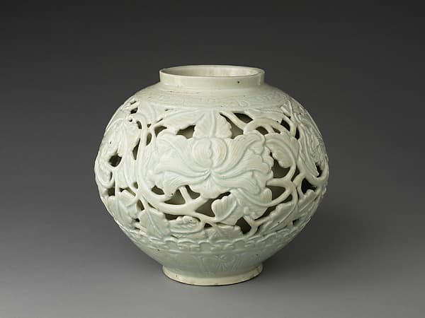 Openwork jar with peonies