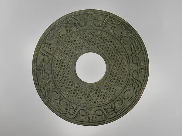 Annular disk with granulation and animal masks (bi)