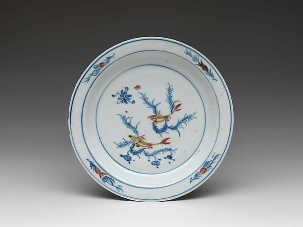Dish with fish in water grasses