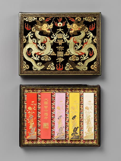 Set of pigment tablets decorated with peony, rock, and magic fungus