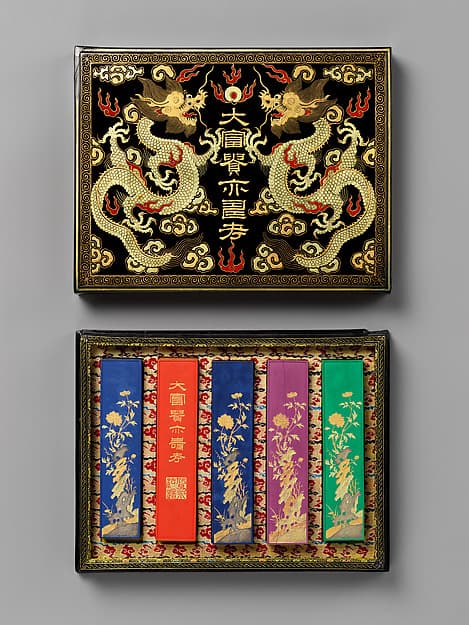 Set of pigment tablets decorated with peony, rock, and magic fungus