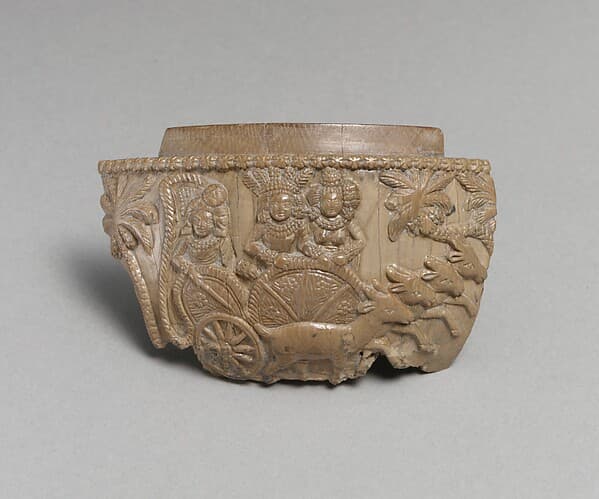 The Moon God Chandra(?) in His Chariot with Wife and Attendant