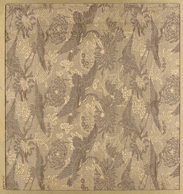 Textile fragment with repeating pattern of cranes and chrysanthemums