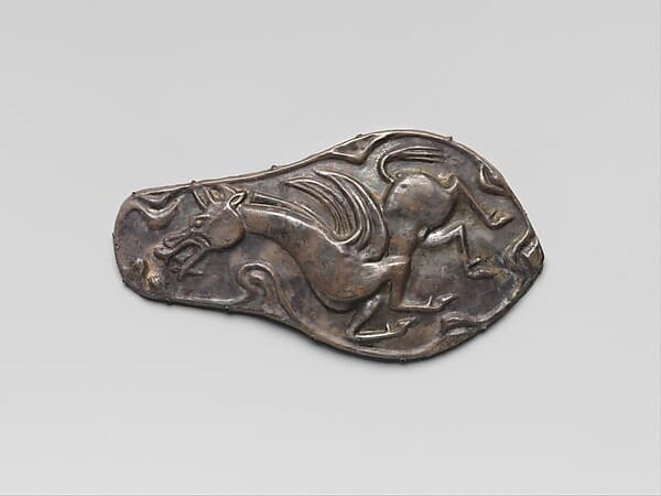Harness ornament with a winged horse