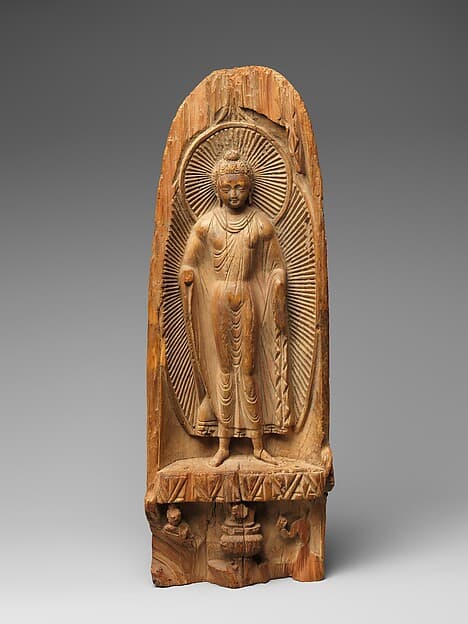 Buddha with radiate halo and mandorla
