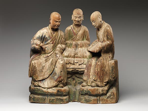 Three seated luohans