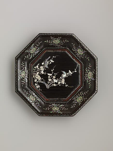 Octagonal dish with flowering plum and magpies