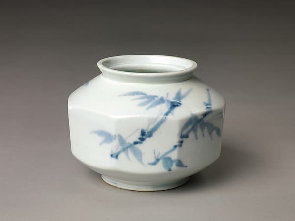 Faceted jar decorated with plum blossoms and bamboo
