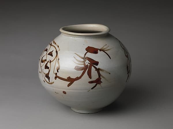 Jar decorated with dragons