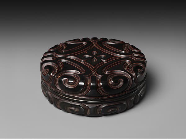 Box with pommel scrolls