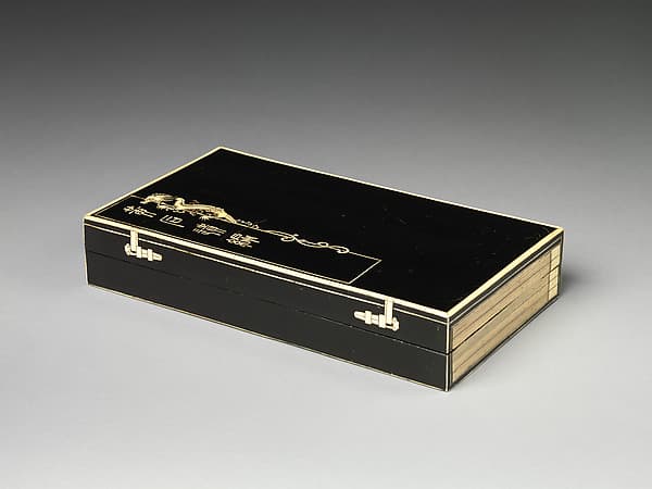 Rectangular box in imitation of a pack of books