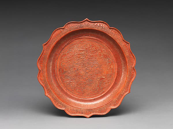 Pedestaled dish with scalloped rim