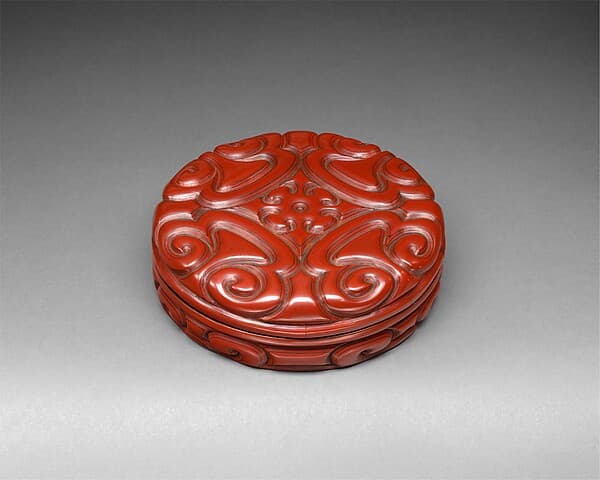Box with pommel scroll