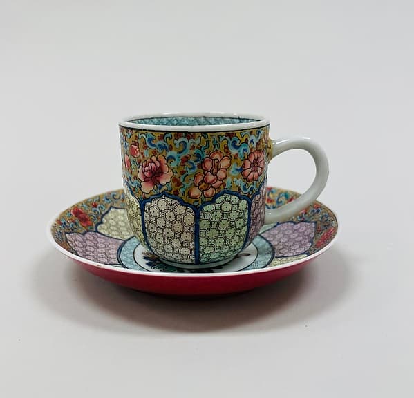 Cup and saucer with floral patterns