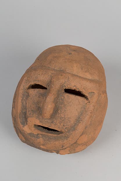 Head of a Masked Clay Tomb Sculpture (Haniwa)