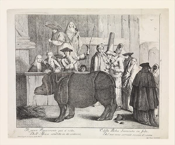 The Rhinoceros, Clara, in the foreground, her keeper holding her horn and a whip behind her at center with various other spectators in Carnival masks, by Alessandro Longhi
