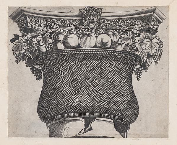 Basket capital with fruit and satyr head, from "Speculum Romanae Magnificentiae", by Monogrammist G.A. with the Caltrop