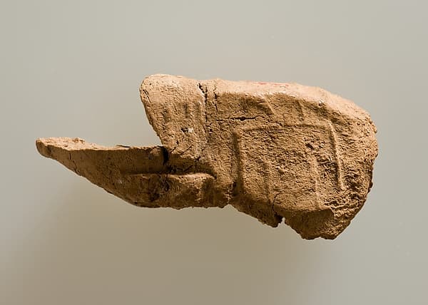 Clay jar sealing impressed faintly with name of Khasekhemwy