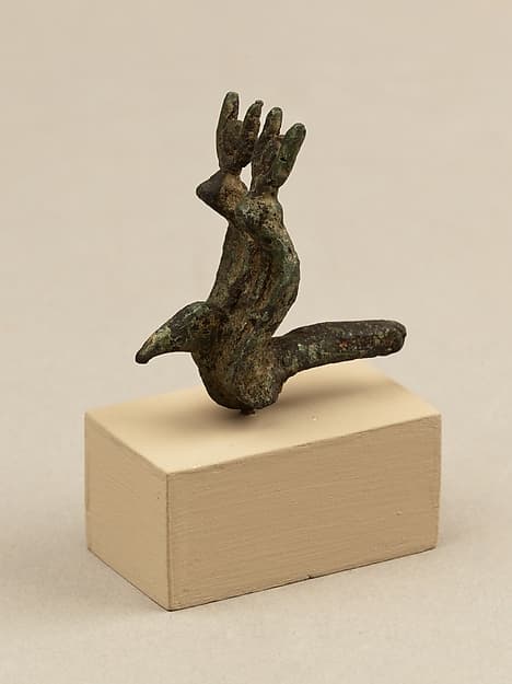 Vulture head and double uraei with disk and horn crowns, from statue of a goddess
