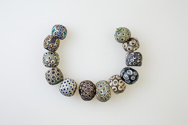 String of 12 Eye Beads
