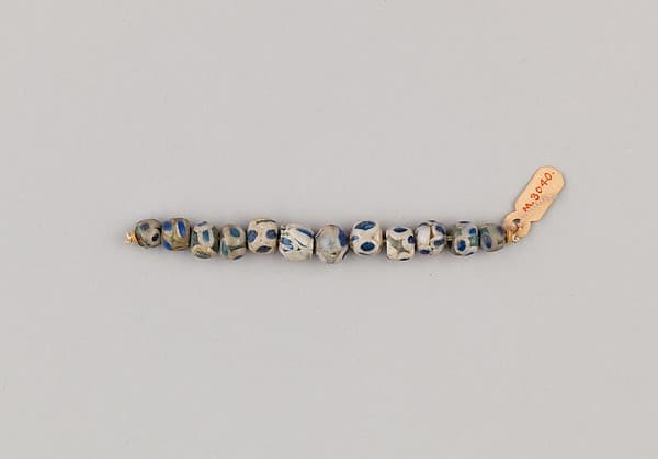 String of 12 Eyed Beads