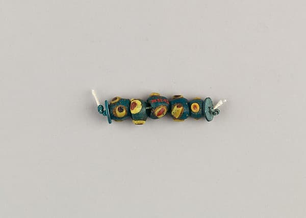 String of 5 eyed beads