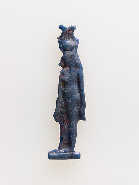 Amulet of cow-headed goddess with feathers atop disk and horns