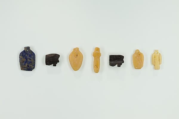 Group of 7 amulets