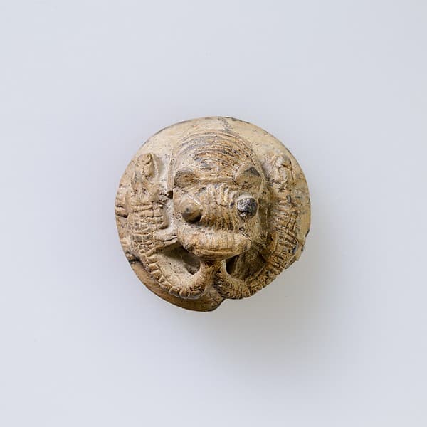 Hippopotamus-Head Design Amulet Inscribed With Four Linked Ibex Heads.