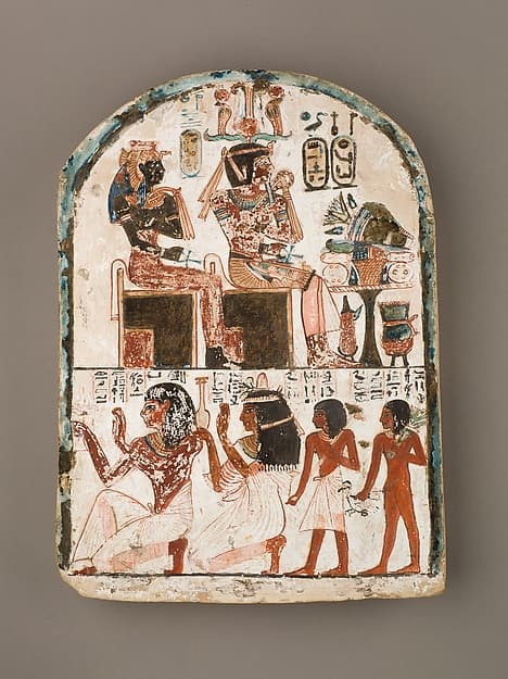 Stela of the Sculptor Qen worshipping Amenhotep I and Ahmose-Nefertari