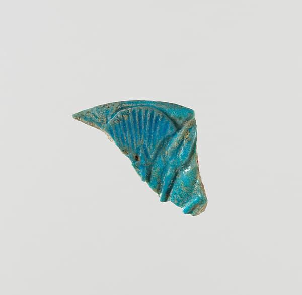 Rim of chalice foot decorated with papyrus