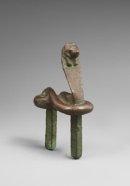 Figure of a rearing cobra with lion head