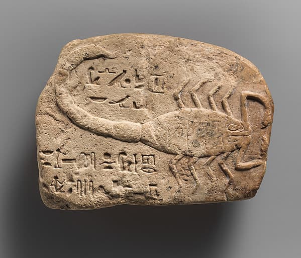 Amuletic stone with a protective spell against scorpions