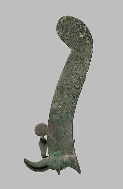 Feather and uraeus attachment for the crown of a large statue of Osiris