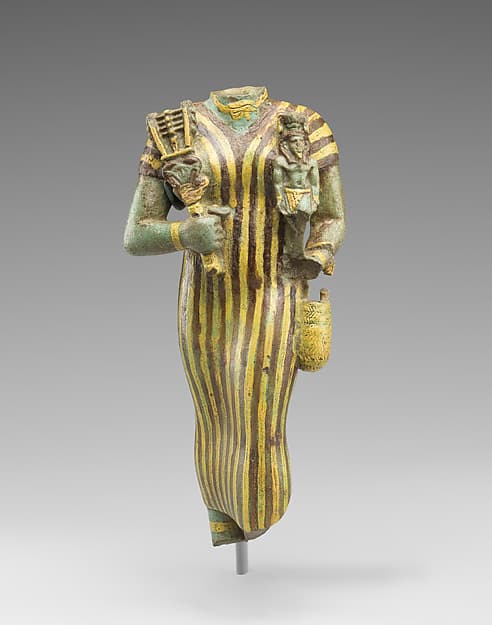Statuette of Bastet holding a figure of Nefertum