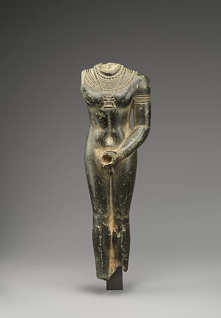 Headless unshrouded ithyphallic deity statuette