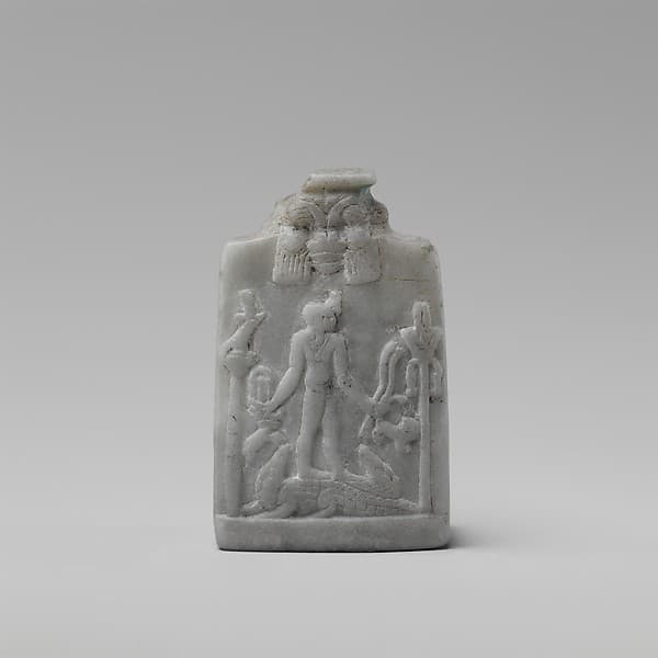 Miniature Cippus (magical stela) with Horus in profile wearing gazelle head on the forehead