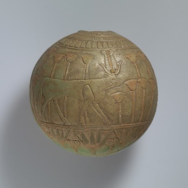 Relief-decorated Lentoid Bottle ("New Year's Bottle"); Horus falcon in marshes on one side; cow goddess in marshes on the other