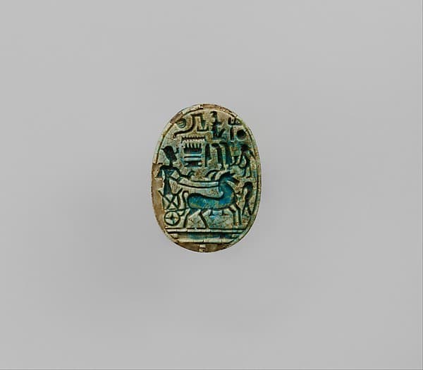 Scarab Inscribed With the Prenomen of Ramesses II and depicting the king in his chariot trampling an enemy