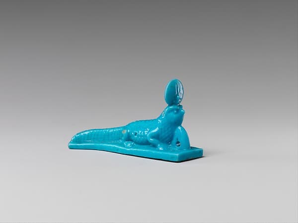 Falcon-headed crocodile amulet