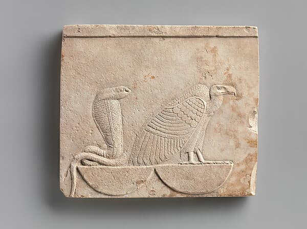 Relief plaque with Wadjet and Nekhbet, the "Two Ladies"; falcon on opposite