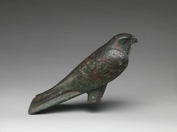 Falcon statue serving as a sarcophagus for a sacred animal