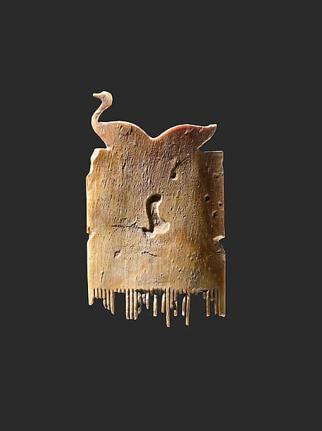 Comb with a pair of ducks