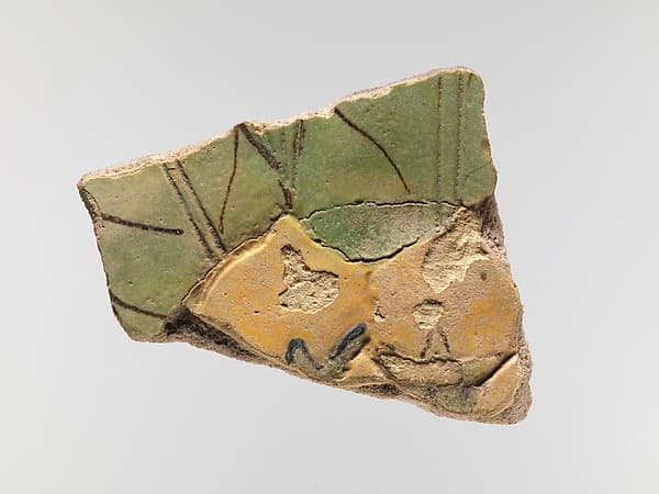 Tile with persea fruit and leaves