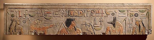 Lintel depicting King Amenemhat I flanked by Nekhbet, Horus, Anubis, and Wadjet
