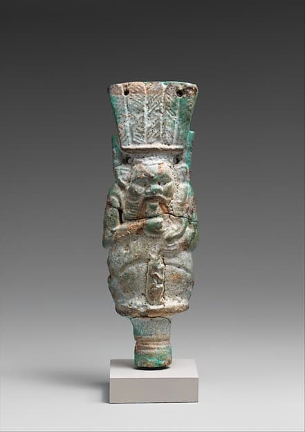 Bes with child on finial