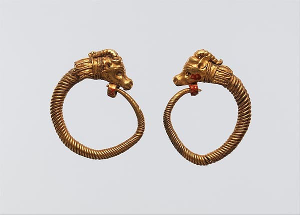 Earrings with ibex head terminal