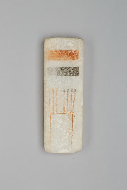 Plaque painted with names of Ramesses IV on one side and as a scribal palette on the other