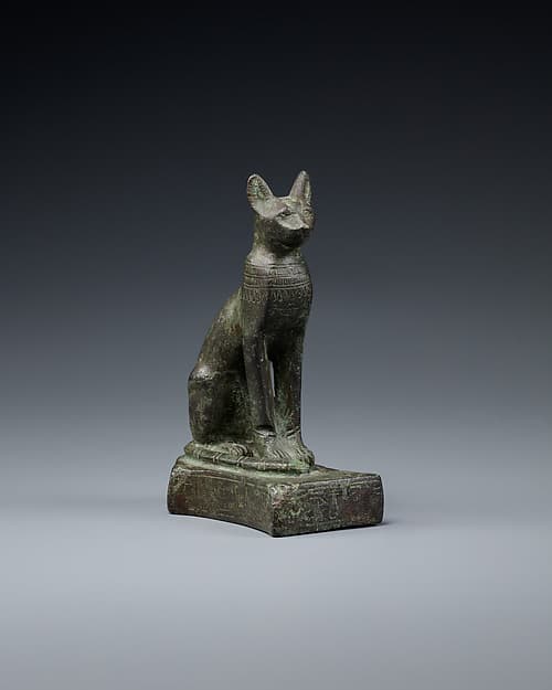Cat with very worn inscription